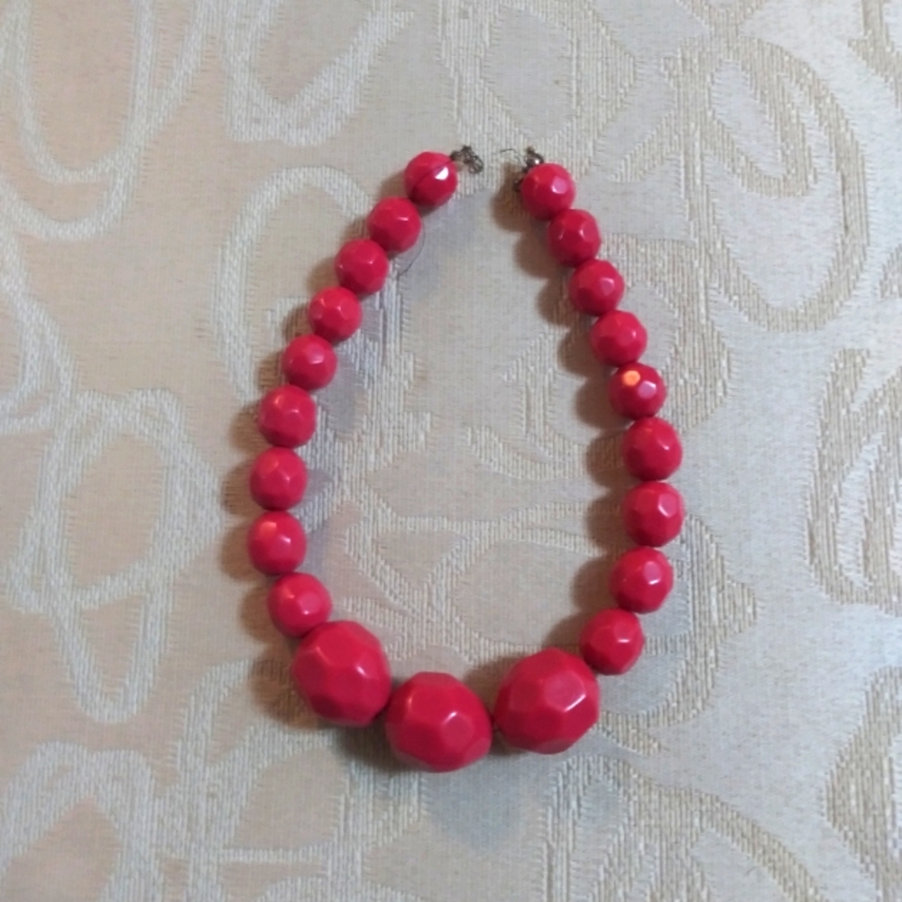 A hot pink beaded necklace